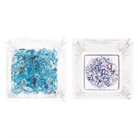 A Bag of Loose Tanzanites and Blue Topaz