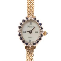 A Lady's 14K Geneve Dress Watch with Sapphires