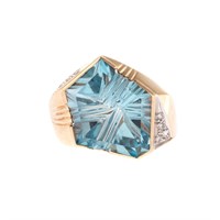 A Lady's Contemporary Blue Topaz & Diamond Ring