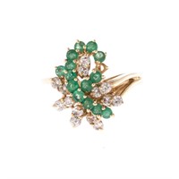 A Lady's Emerald and Diamond Cocktail Ring
