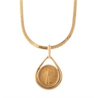 A Lady's Necklace with Gold Coin Pendant in Gold