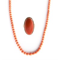 A Strand of Coral Beads and Coral Ring in Gold