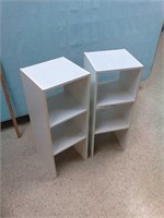 Two white shelving units Shelf