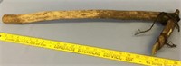 St. Lawrence Island artifact, has a stone blade an