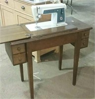 Singer sewing machine and cabinet