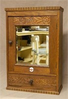 Floral Carved Oak Medicine Cabinet.