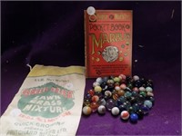Grass Seed bag full of Antique marbles w/ book