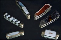 Collection of MOP inlaid pocket knives
