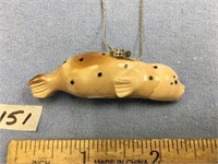 2.25" fossilized ivory seal with baleen spots and