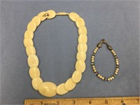 14" flat bead bone necklace with a screw clasp and