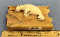 1.75" white ivory walrus mounted on a 2.5" piece o