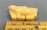 An extremely well done core walrus ivory seal moun