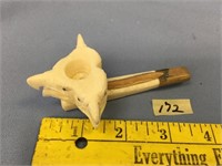 An ivory pipe done out of mammoth and white walrus