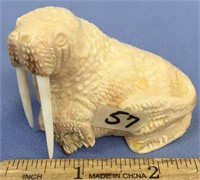 1.75" fossilized walrus ivory walrus carving with
