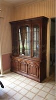 81" T x 60" W Thomasville gridded china cabinet
