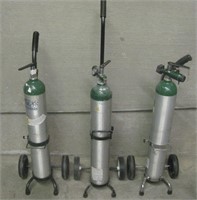 Lot of 3 Tall Oxygen Tanks with Carts