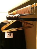 Gold metal hangers - pants hangers - closet