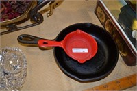 2 small cast frying pans