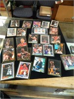 Many Many Basket Ball Cards In Protective Sleeves