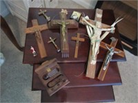 7 crucifixes & wooden box with holy water jar
