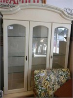 Wooden yellow lighted china cabinet with bamboo