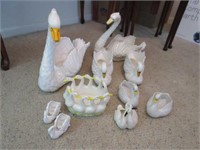 family of 10 ceramic geese