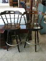 Pair of matching wood bar height swivel bar stools