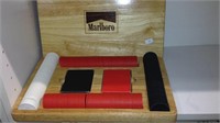 One wood box storage case filled with poker chips