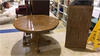 Oak claw foot dining table with one leaf