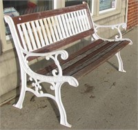 Cast iron and wood park bench. Measures 50" long.