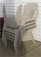 (4) Matching plastic outdoor chairs and (4)