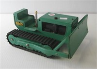 Vintage metal Tonka bulldozer. Measures 9" long.