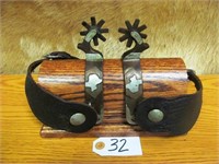 Stockard single mounted spurs #3 with "RC" initial