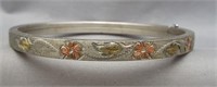 Sterling silver bangle style bracelet with floral