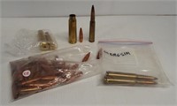 (39) 50 cal. Bullet heads, (3) 50 cal. Live