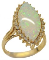 14K LADIES'  RING WITH OPAL AND DIAMONDS.