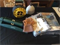 Extension cord reel, a tarp, a sprinkler and more