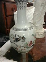Small vase with swallows and cherry blossom design