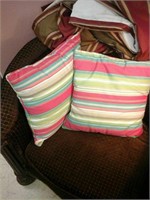 Pair of multicolored striped pillows