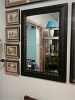 Dark wood framed mirror