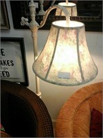 Tall white standing lamp with floral shade