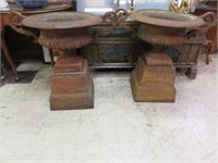 PAIR OF HIGHLY ORNATE CAST IRON URN PLANTERS ON
