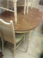 Wooden yellow and brown shabby chic table with 4