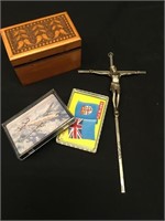 A crucifix and cards