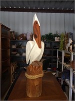Wood carved pelican