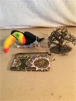 Copper tree, beaded bag and a parrot