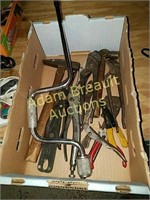 Hammers, pliers, channel locks, wire cutters