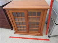 smaller pine cabinet (2 sliding doors) - 28in wide