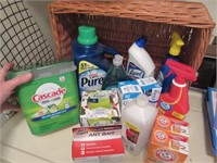 basket with unused detergent & other items