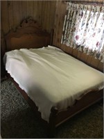 Full size bed w/ornate wood head & foot board